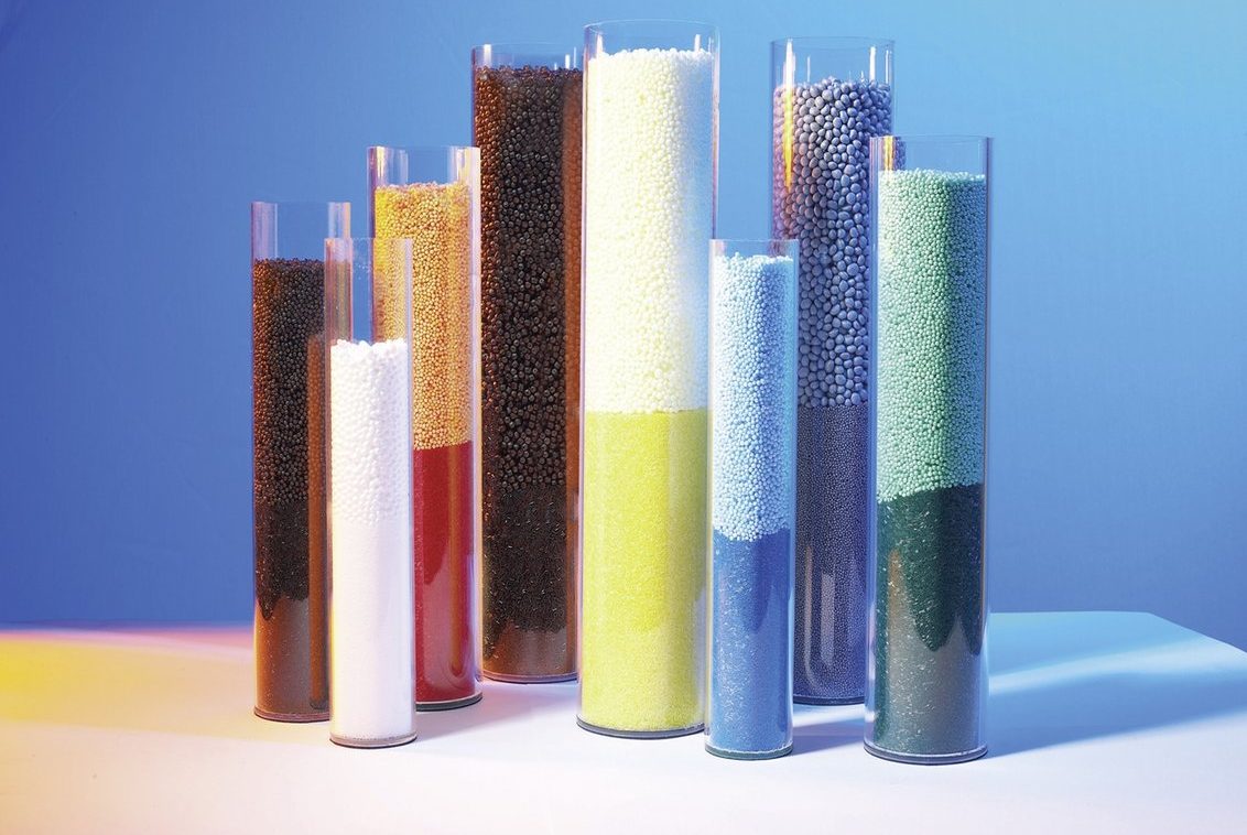Tubes filled with different colored stones